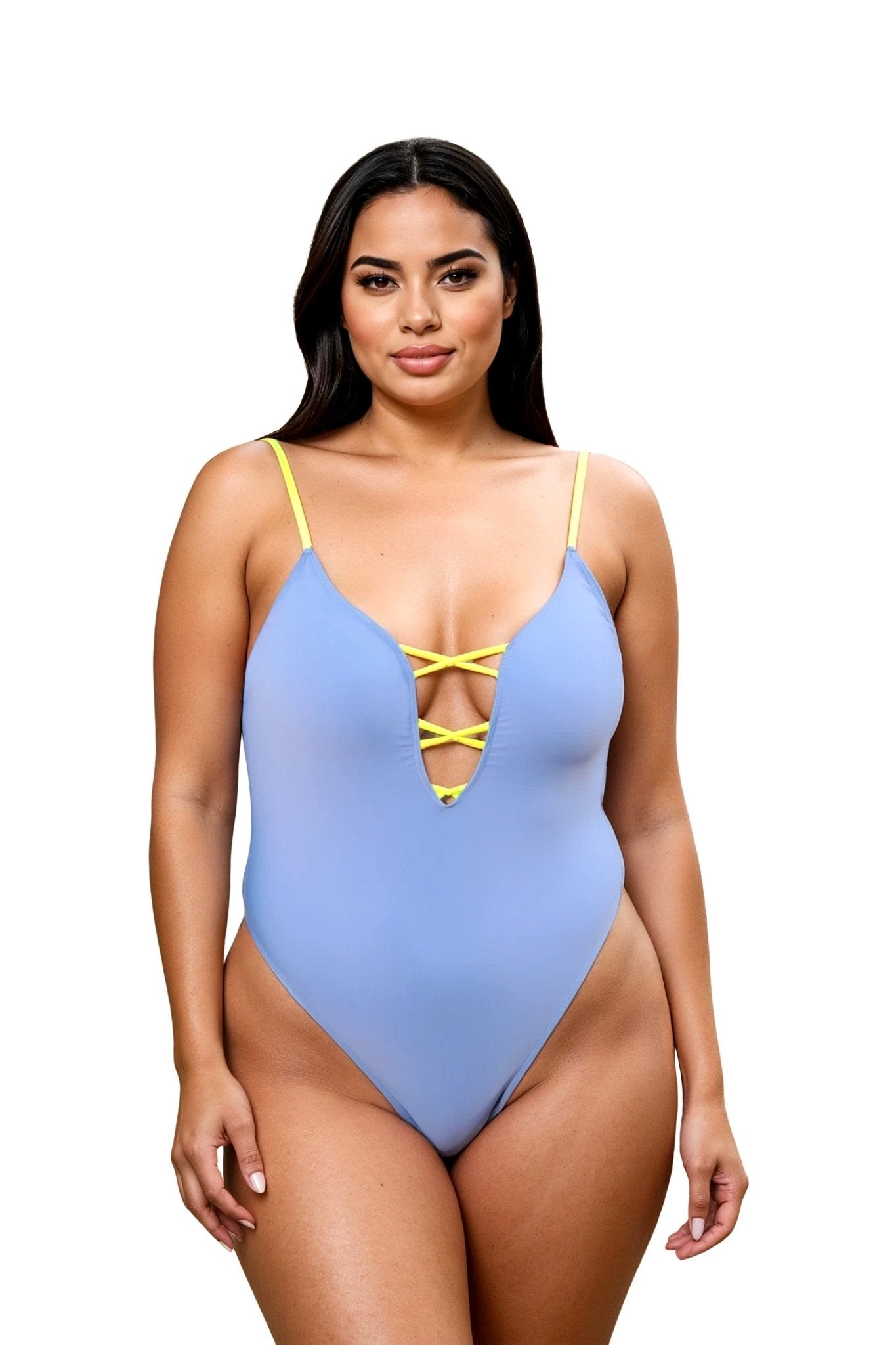 Two women in matching navy blue swimsuit cover-ups pose by a pool with water and palm trees in the background.