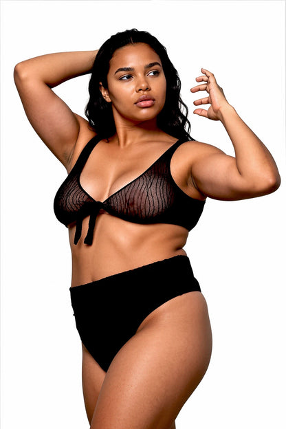 Model wears the Brigitewear International, LLC Front Tie See Through Bikini Top, posing confidently against a white background.