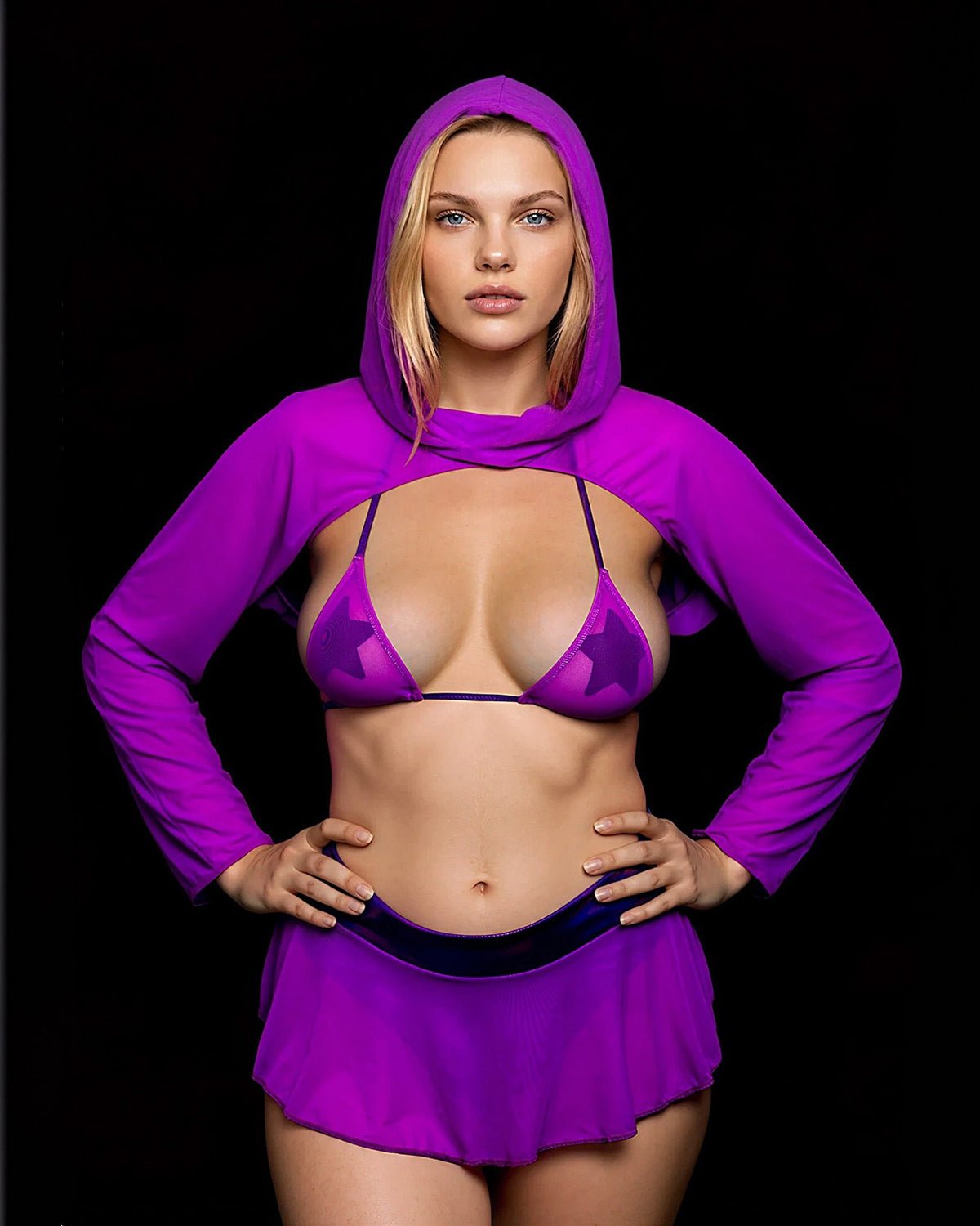 A person wears a Grape Babe Mesh Hooded Shrug, a star-patterned bikini top, and a matching skirt.
