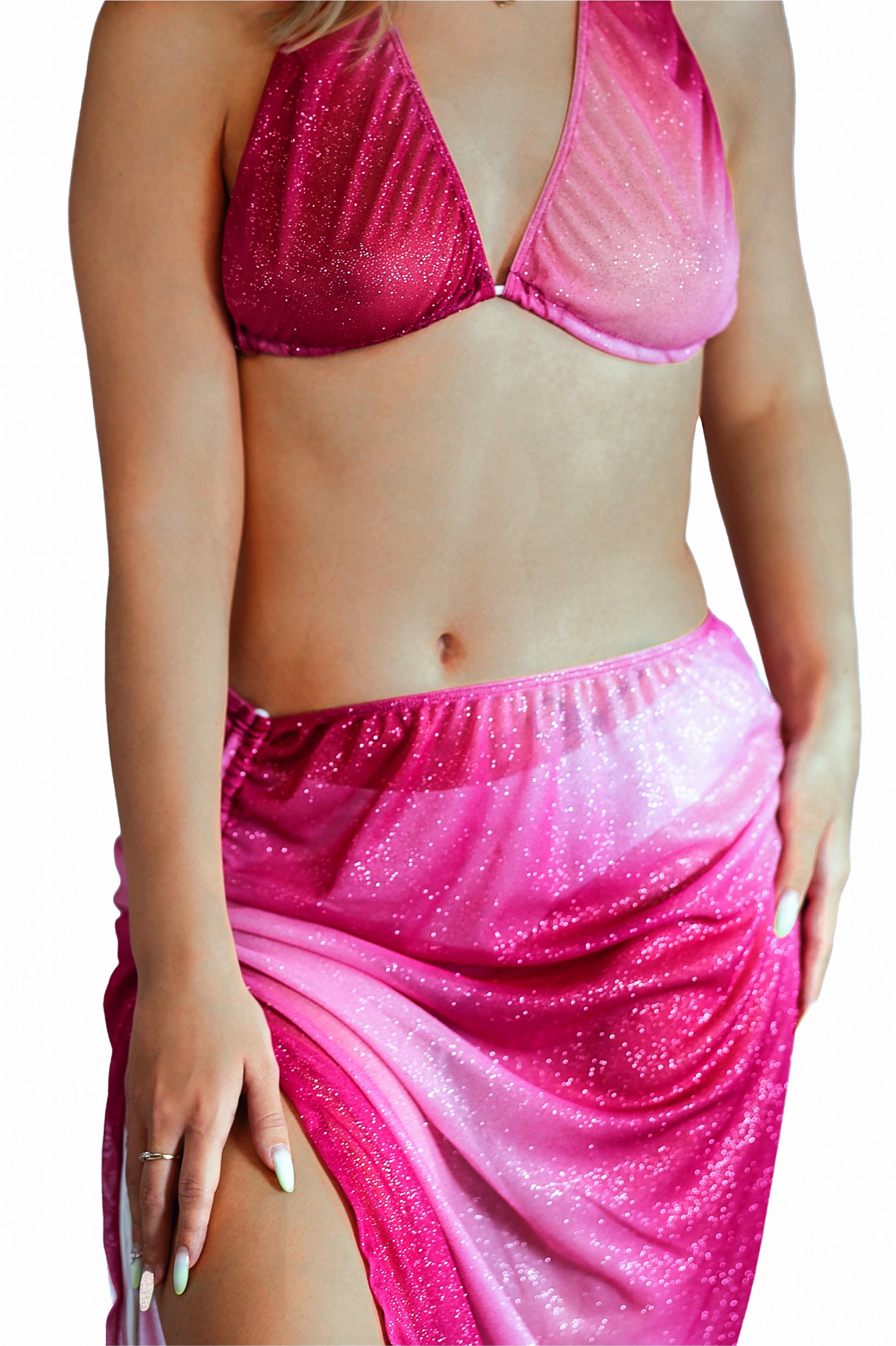 Woman wearing Brigitewear International, LLC’s Pink Sparkle Ombre Scrunchie Skirt and a matching sparkly pink halter bikini top, posing with hand on knee.