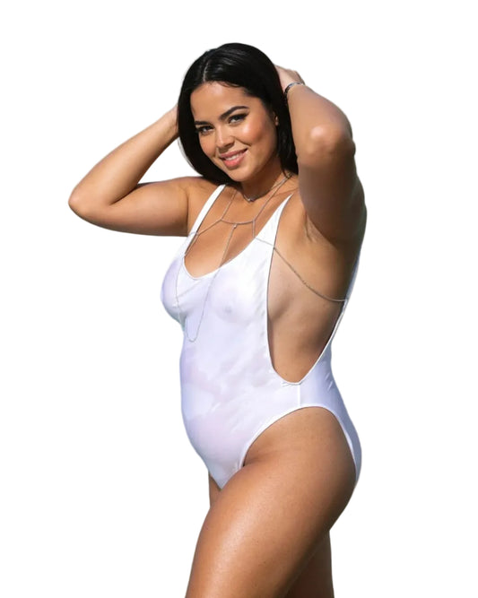 Model wearing the Side Boob Rio Swimsuit by Brigitewear International, LLC poses with hands behind her head, smiling against a white background.