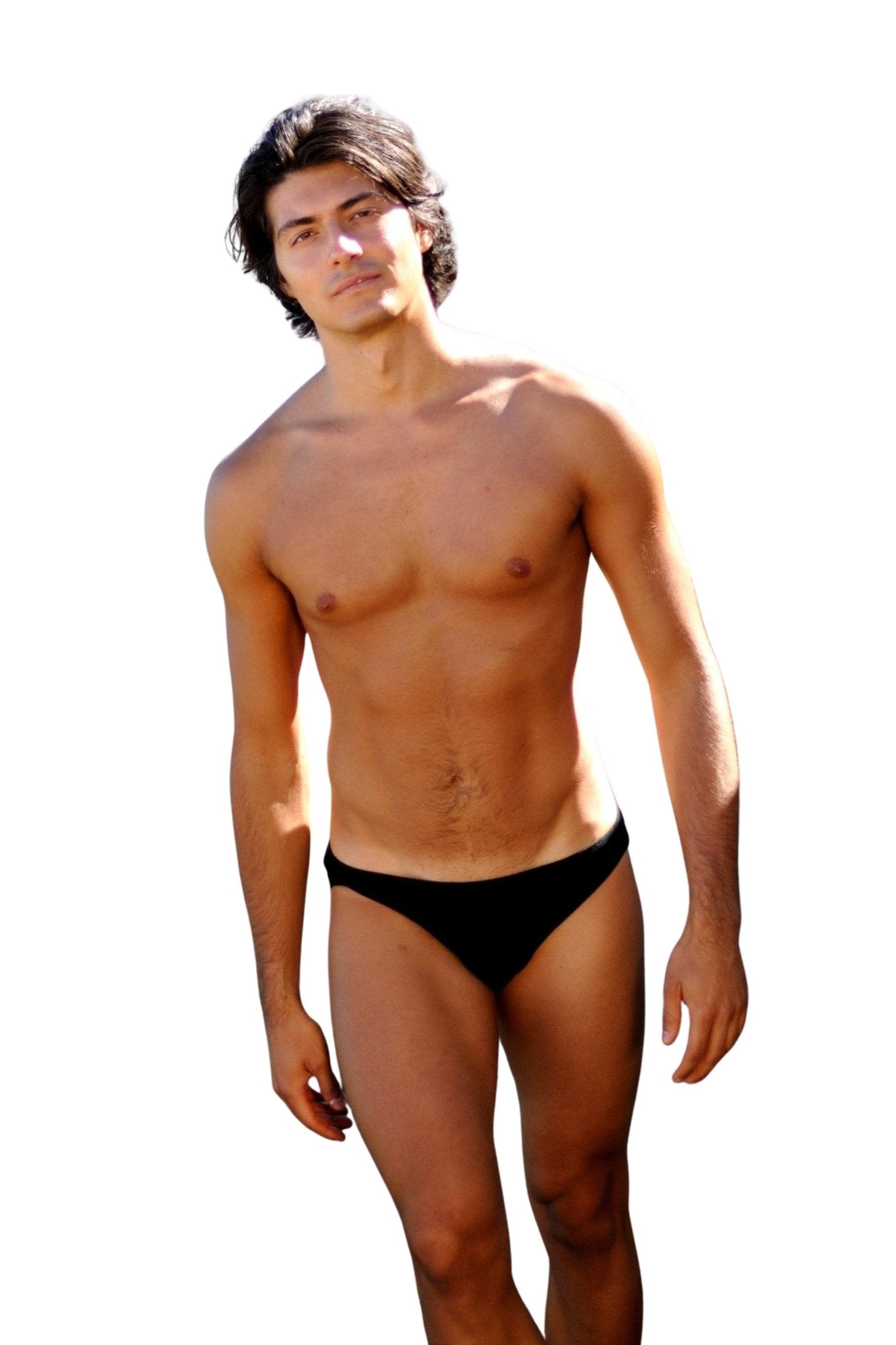 A young man models the Brigitewear International, LLC Speedster Men’s Swimsuit – Classic European Style Swim Brief against a white background.